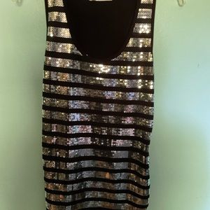 Body central sequin tank top.